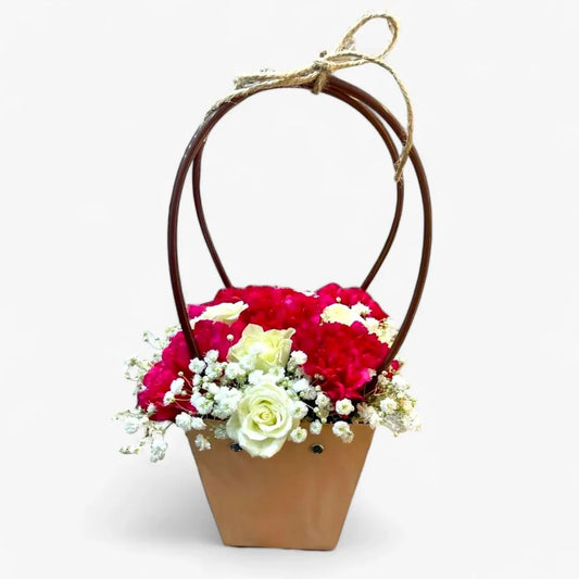 Elegant Basket of Red and White Roses with Baby’s Breath